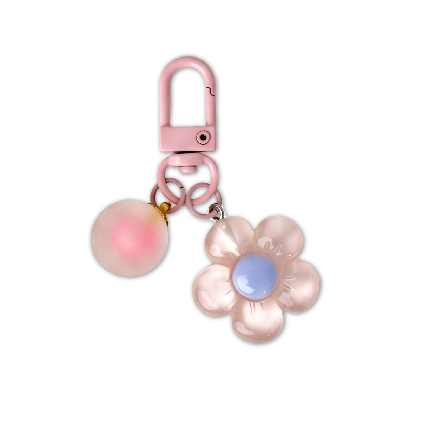 Pink flower-shaped keychain with a carabiner on a white background