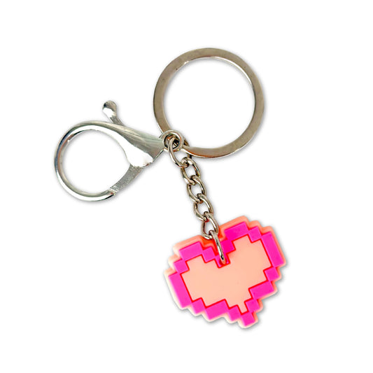 Pixel heart keychain on a white background