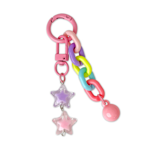 Colorful keychain with star and ball charms on a white background